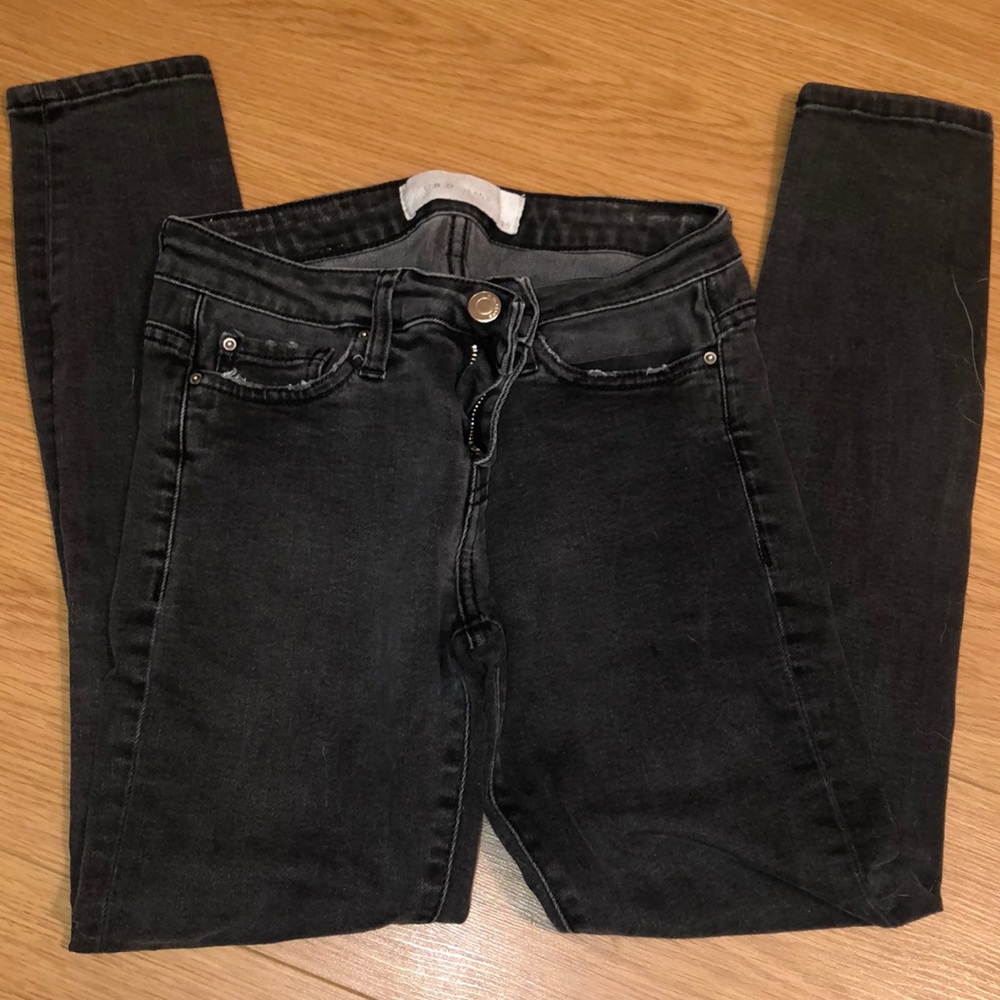 Black faded skinny jeans